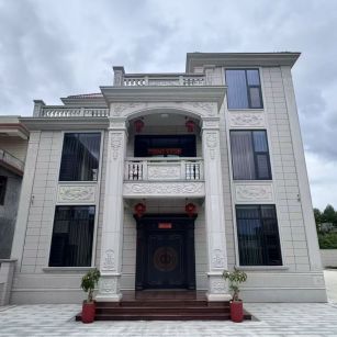 海南 芝麻白石材别墅干挂案例展示