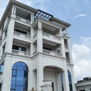 海南芝麻白别墅干挂效果展示