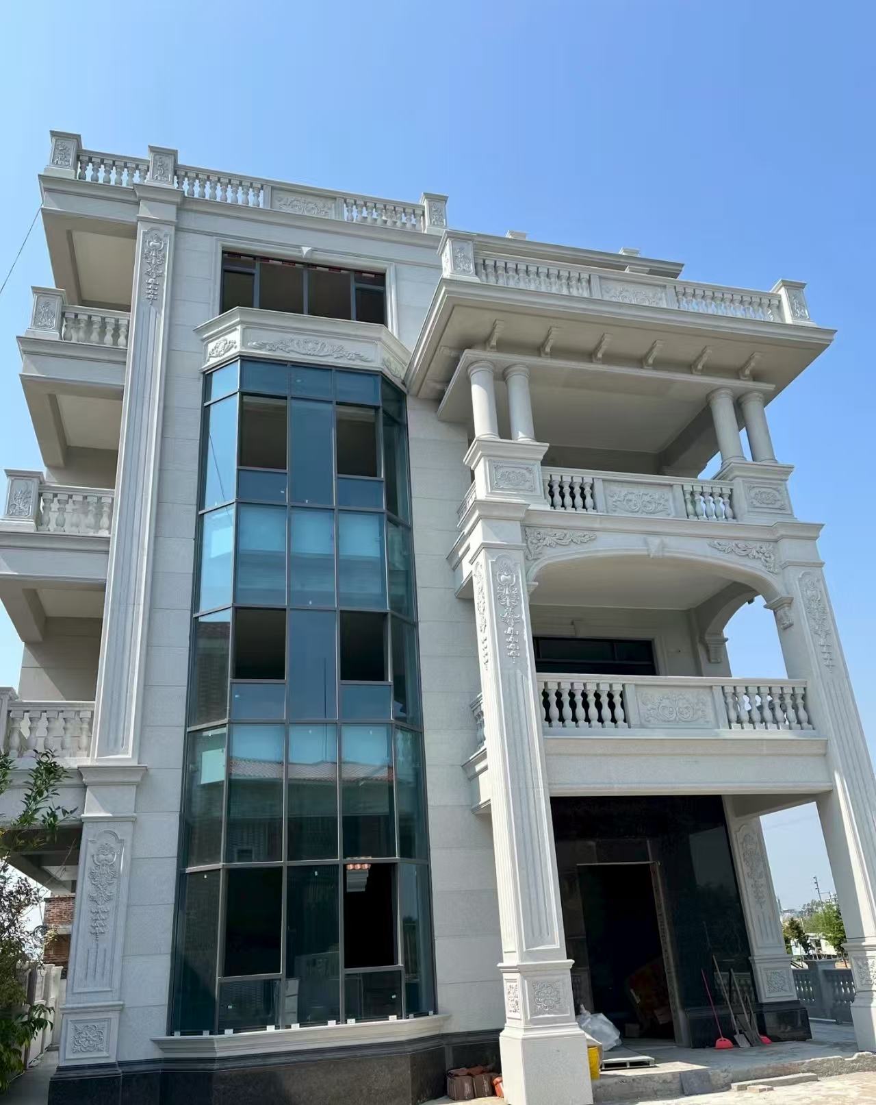 海南 芝麻白花岗岩别墅外墙干挂效果展示